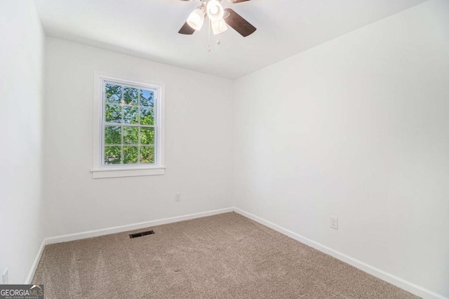 15 Cedar Ln E, Newnan, GA 30263 - carpeted empty room featuring baseboards and ceiling fan