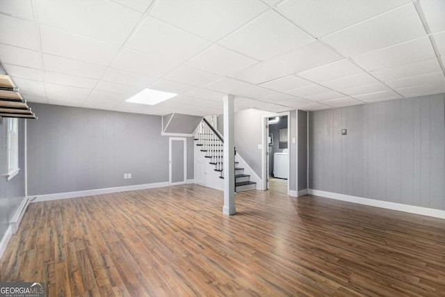 15 Cedar Ln E, Newnan, GA 30263 - finished basement with stairs, wood finished floors, a paneled ceiling, and wooden walls
