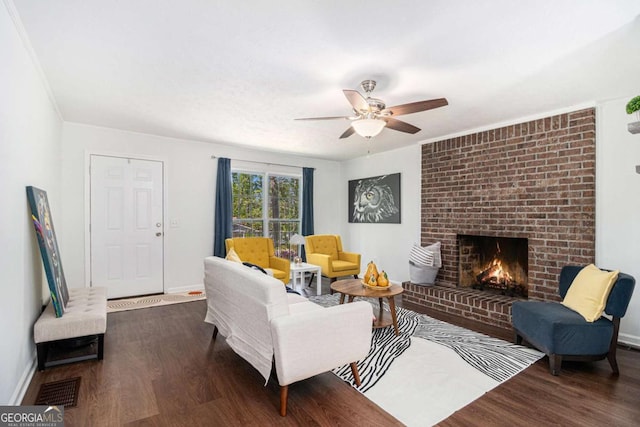 15 Cedar Ln E, Newnan, GA 30263 - living room featuring dark wood-type flooring, ceiling fan, and a brick fireplace