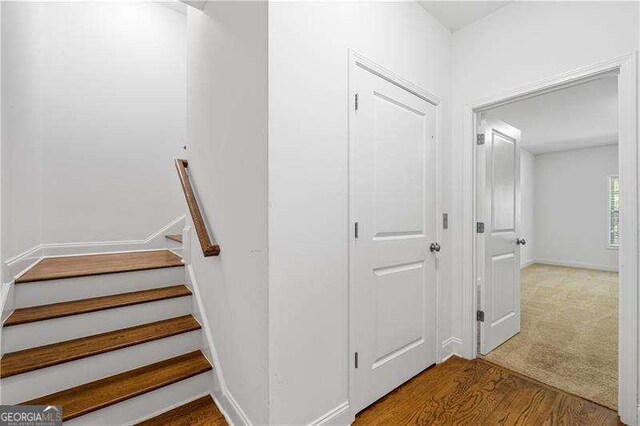 4089 Thorndale Ln Unit 13, Smyrna, GA 30080 - staircase with wood finished floors and baseboards