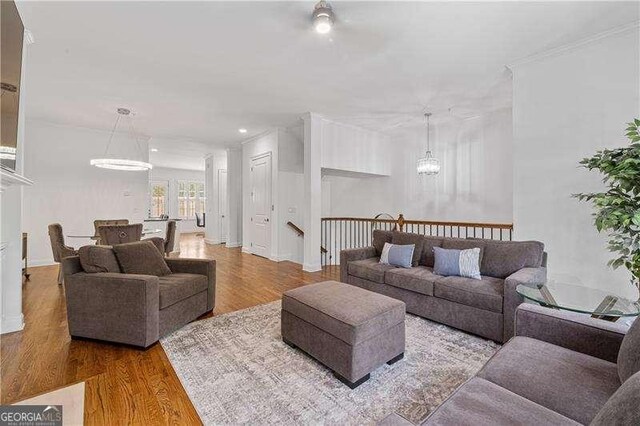 4089 Thorndale Ln Unit 13, Smyrna, GA 30080 - living area featuring wood finished floors, a chandelier, and recessed lighting