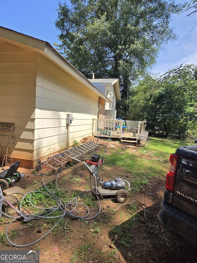 8778 Homewood Ct, Riverdale, GA 30274 - view of yard with a wooden deck