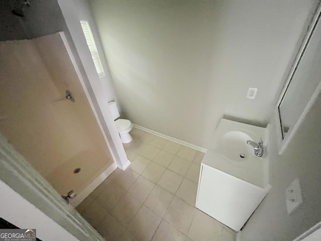 1050 Wheel House Ln Unit A, Monroe, GA 30655 - bathroom with vanity, tile patterned flooring, and a shower