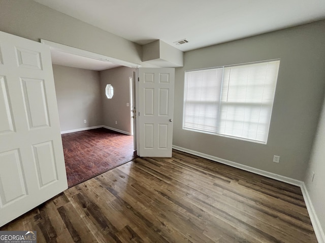 1050 Wheel House Ln Unit A, Monroe, GA 30655 - empty room featuring dark wood finished floors and baseboards