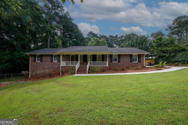 2202 Springdale Dr, Snellville, GA 30078 - ranch-style house with covered porch and brick siding