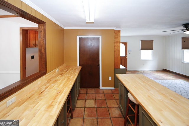 2202 Springdale Dr, Snellville, GA 30078 - kitchen with wooden counters, ceiling fan, and open floor plan