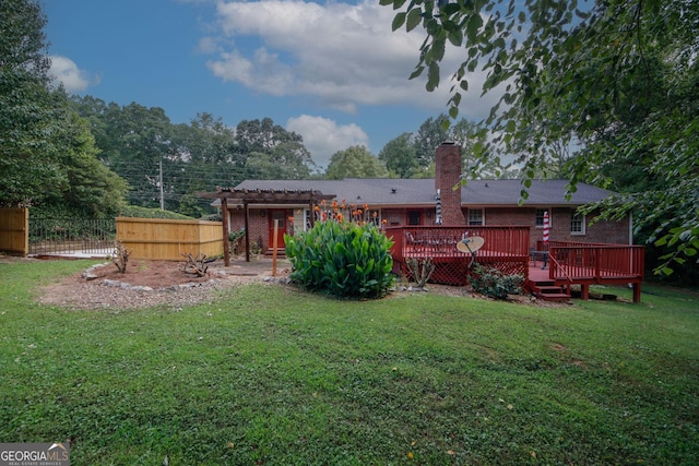 2202 Springdale Dr, Snellville, GA 30078 - back of house featuring a pergola, a deck, a chimney, and brick siding
