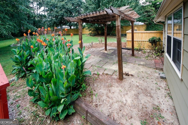 2202 Springdale Dr, Snellville, GA 30078 - fenced backyard with a pergola and a patio