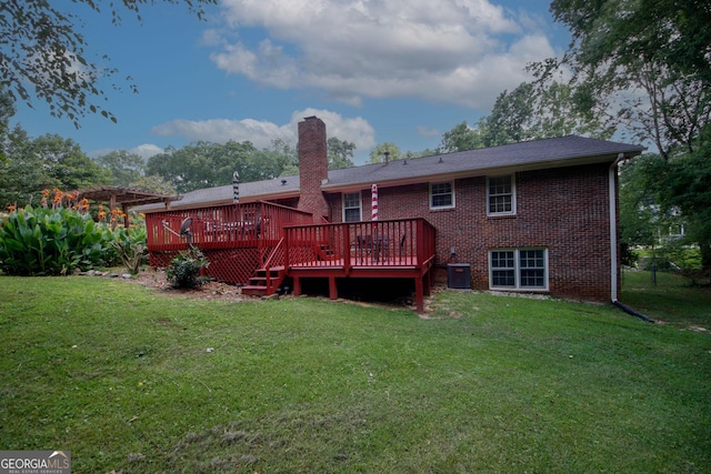 2202 Springdale Dr, Snellville, GA 30078 - back of property featuring brick siding, a deck, and a yard
