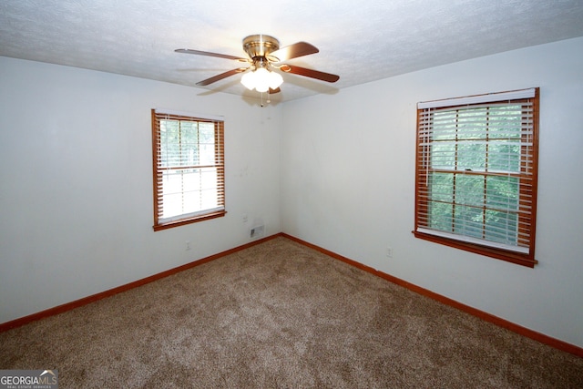 2202 Springdale Dr, Snellville, GA 30078 - carpeted spare room with ceiling fan and baseboards