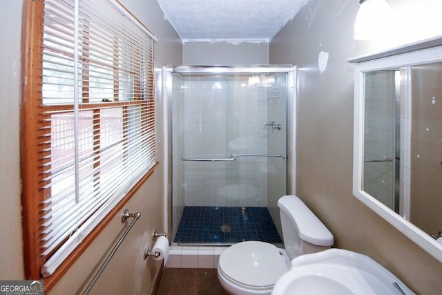 2202 Springdale Dr, Snellville, GA 30078 - bathroom with a shower stall and a textured ceiling