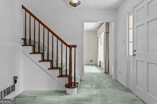 175 Cedar Creek Dr, Athens, GA 30605 - carpeted entrance foyer featuring stairway and baseboards