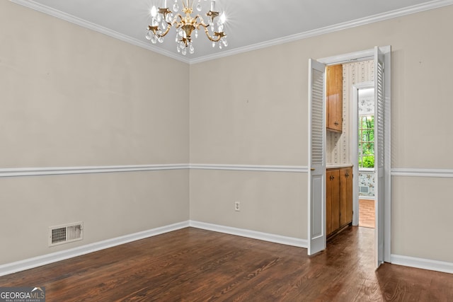 175 Cedar Creek Dr, Athens, GA 30605 - spare room with a chandelier, dark wood-type flooring, and crown molding