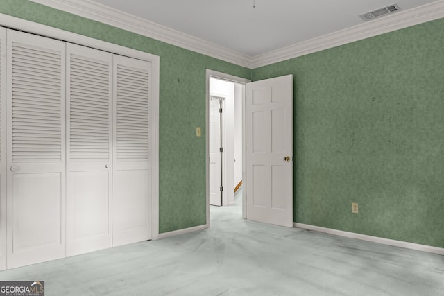 175 Cedar Creek Dr, Athens, GA 30605 - unfurnished bedroom with a closet, crown molding, and carpet