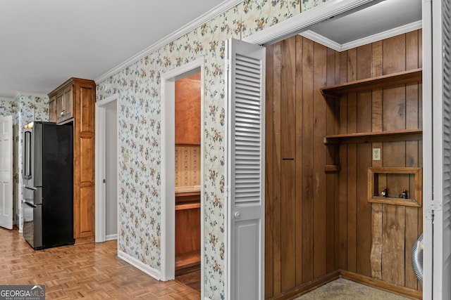 175 Cedar Creek Dr, Athens, GA 30605 - kitchen featuring freestanding refrigerator, wallpapered walls, ornamental molding, and brown cabinetry