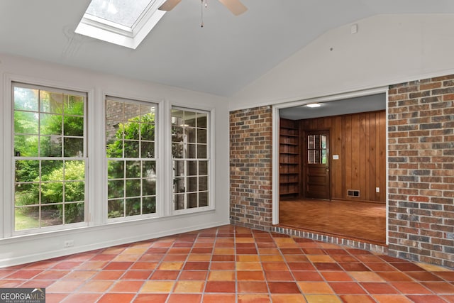 175 Cedar Creek Dr, Athens, GA 30605 - unfurnished sunroom featuring lofted ceiling, plenty of natural light, and a skylight