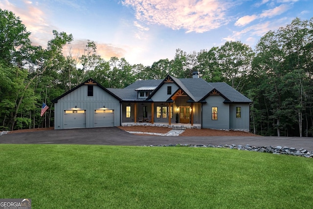 121 White Pen Rd, Talking Rock, GA 30175 - view of front of house with a porch, a front yard, driveway, board and batten siding, and a chimney