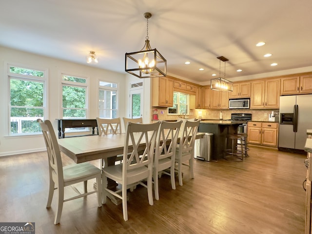 48 Red Bud Ln, Dallas, GA 30132 - dining room with wood finished floors, plenty of natural light, recessed lighting, and a chandelier