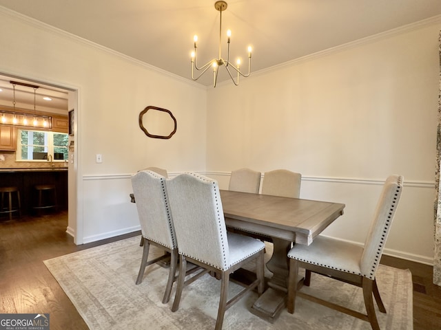 48 Red Bud Ln, Dallas, GA 30132 - dining area featuring a chandelier, crown molding, and wood finished floors