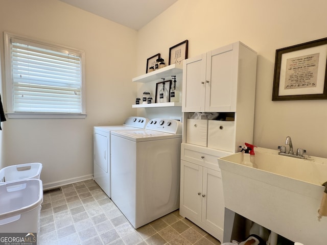 48 Red Bud Ln, Dallas, GA 30132 - laundry room featuring cabinet space and independent washer and dryer