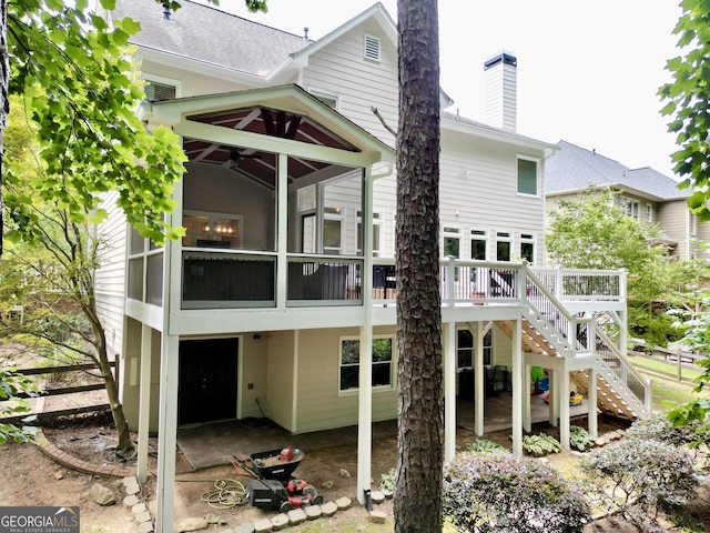 48 Red Bud Ln, Dallas, GA 30132 - rear view of property with stairway, a patio, a chimney, a sunroom, and a wooden deck