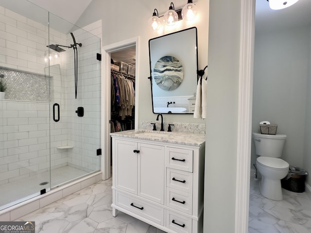 48 Red Bud Ln, Dallas, GA 30132 - full bathroom featuring marble finish flooring, a stall shower, vanity, a spacious closet, and lofted ceiling