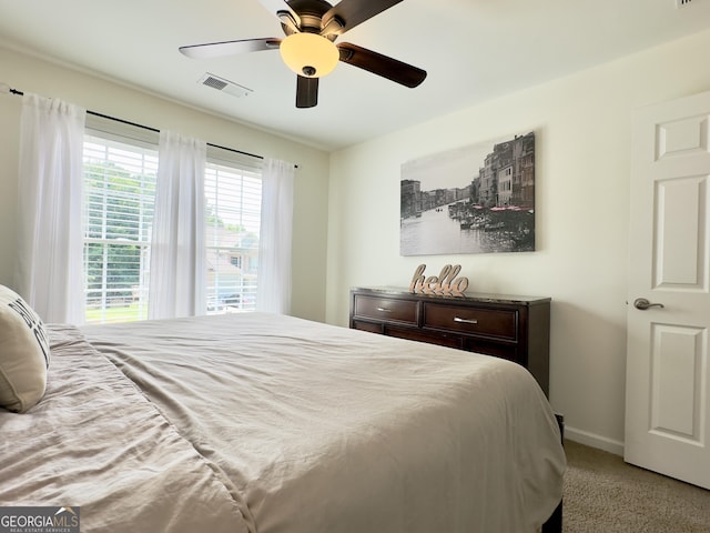 48 Red Bud Ln, Dallas, GA 30132 - bedroom with light colored carpet and ceiling fan