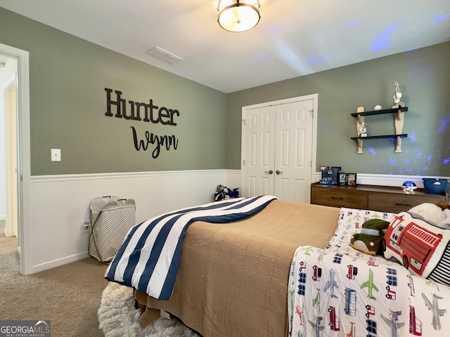 48 Red Bud Ln, Dallas, GA 30132 - bedroom featuring carpet flooring and a closet