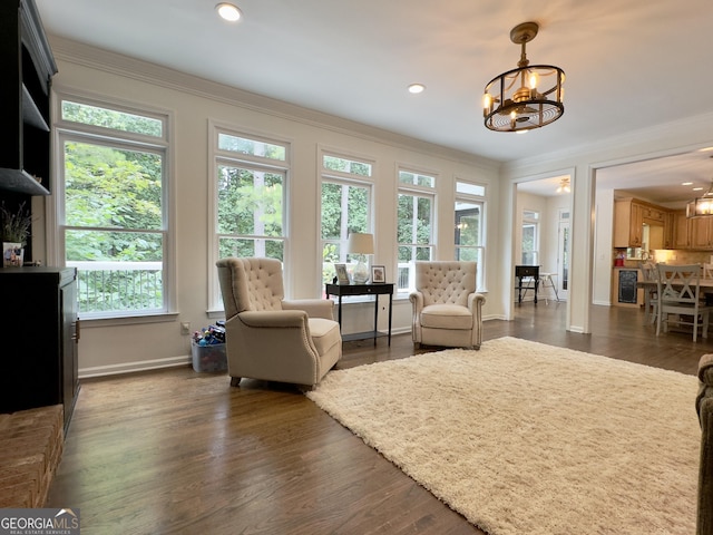 48 Red Bud Ln, Dallas, GA 30132 - living room with a chandelier, crown molding, recessed lighting, and dark wood-style flooring