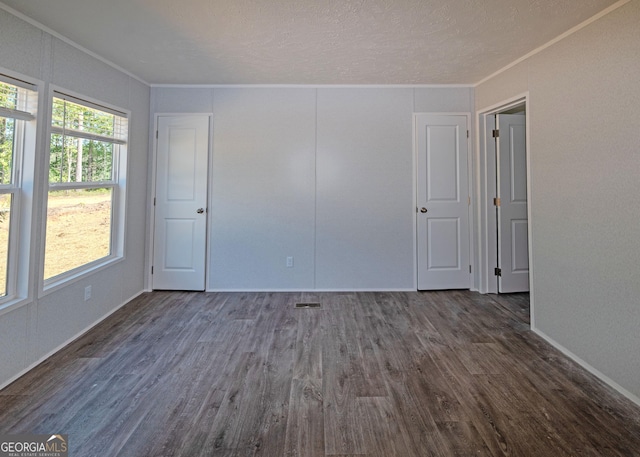 871 W Leatherwood Rd, Toccoa, GA 30577 - unfurnished room with crown molding and dark wood finished floors