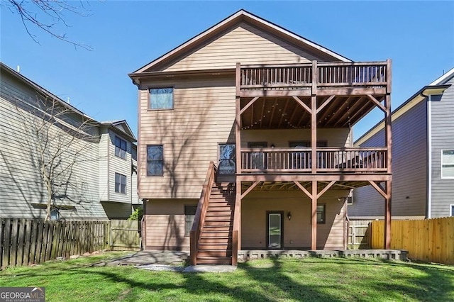 2108 Main St NW, Atlanta, GA 30318 - back of house featuring a fenced backyard, a deck, and stairway