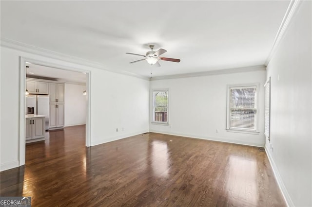 2108 Main St NW, Atlanta, GA 30318 - empty room featuring ceiling fan, dark wood-type flooring, and ornamental molding