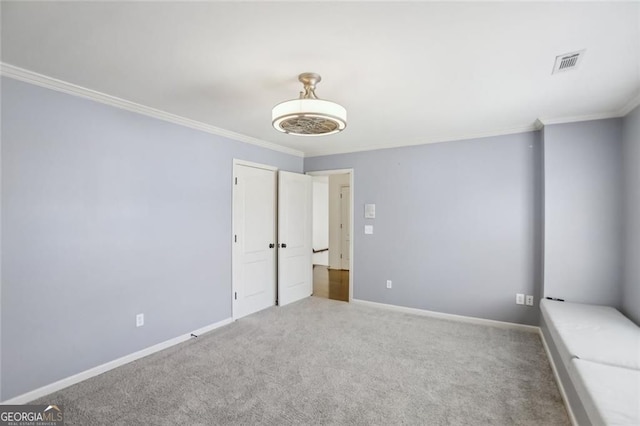 2108 Main St NW, Atlanta, GA 30318 - unfurnished bedroom featuring crown molding and carpet floors