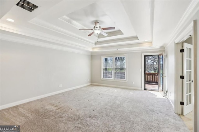 2108 Main St NW, Atlanta, GA 30318 - spare room featuring a tray ceiling, ornamental molding, a ceiling fan, and carpet flooring
