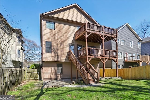 2108 Main St NW, Atlanta, GA 30318 - rear view of house featuring a fenced backyard, a gate, a deck, and stairs