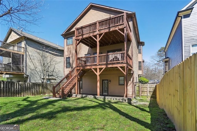 2108 Main St NW, Atlanta, GA 30318 - back of property featuring a fenced backyard, a deck, and stairs
