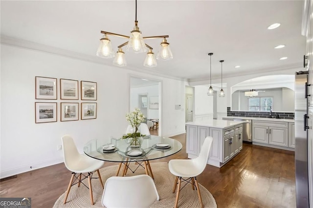 2108 Main St NW, Atlanta, GA 30318 - dining room featuring arched walkways, dark wood finished floors, crown molding, and recessed lighting