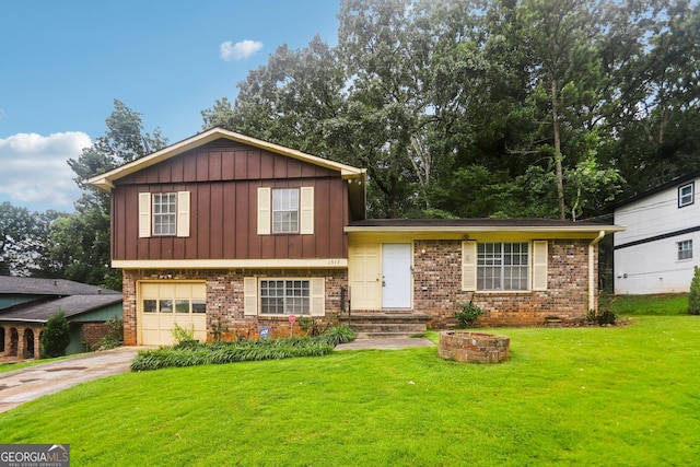 1517 Indian Forest Trl, Stone Mountain, GA 30083 - tri-level home with an attached garage, concrete driveway, a front yard, and brick siding
