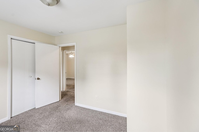 1517 Indian Forest Trl, Stone Mountain, GA 30083 - unfurnished bedroom with carpet and a closet