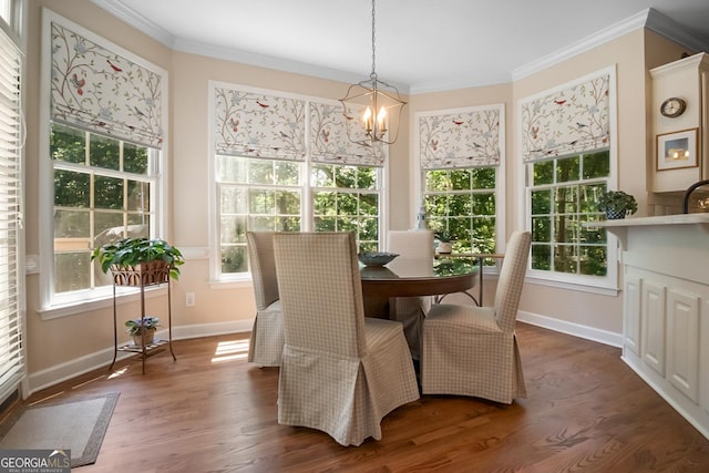6380 Bannerhorn Run, Alpharetta, GA 30005 - dining space with a chandelier, crown molding, and wood finished floors