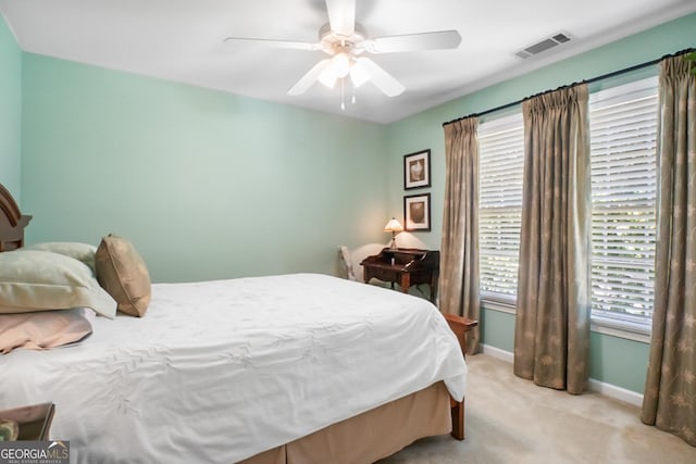 6380 Bannerhorn Run, Alpharetta, GA 30005 - bedroom with light colored carpet and a ceiling fan