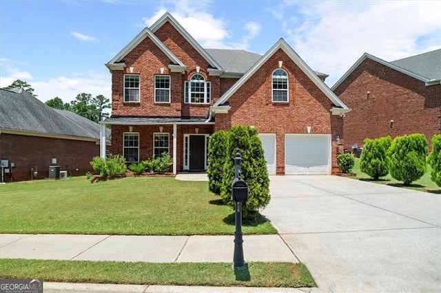 1147 Scenic Park Trl, Lawrenceville, GA 30046 - traditional-style house featuring brick siding, an attached garage, concrete driveway, and a front yard