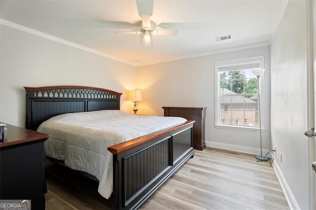 1147 Scenic Park Trl, Lawrenceville, GA 30046 - bedroom with light wood-style flooring, crown molding, and ceiling fan