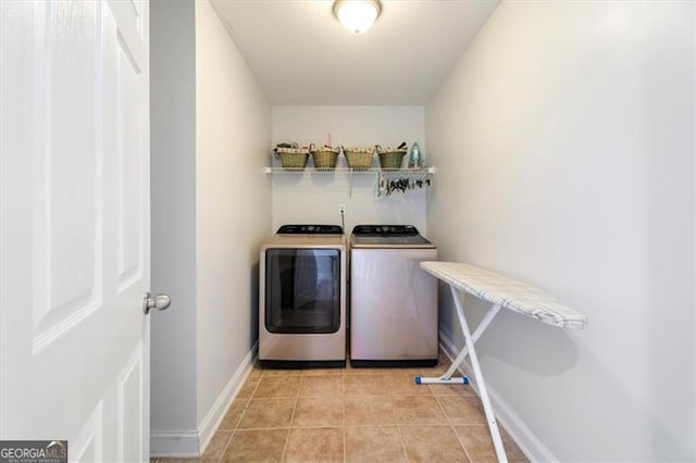 1147 Scenic Park Trl, Lawrenceville, GA 30046 - laundry area with separate washer and dryer and light tile patterned floors