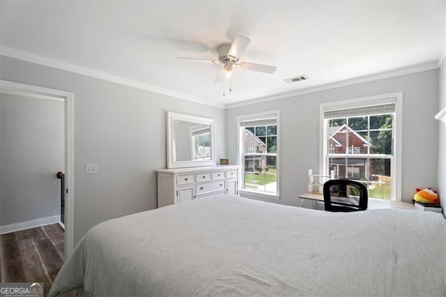 1147 Scenic Park Trl, Lawrenceville, GA 30046 - bedroom with wood finished floors, crown molding, and a ceiling fan