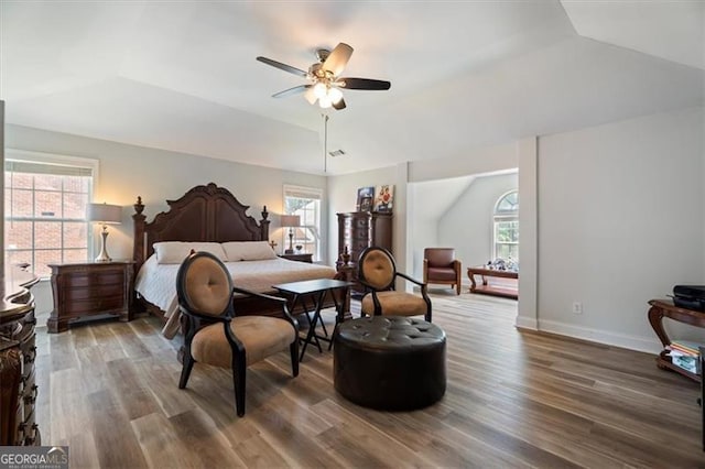 1147 Scenic Park Trl, Lawrenceville, GA 30046 - bedroom with vaulted ceiling, wood finished floors, and a ceiling fan