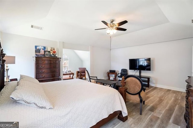 1147 Scenic Park Trl, Lawrenceville, GA 30046 - bedroom with lofted ceiling, wood finished floors, and ceiling fan