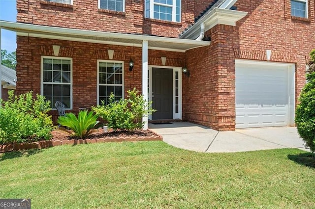1147 Scenic Park Trl, Lawrenceville, GA 30046 - entrance to property with brick siding, a garage, a yard, concrete driveway, and a porch