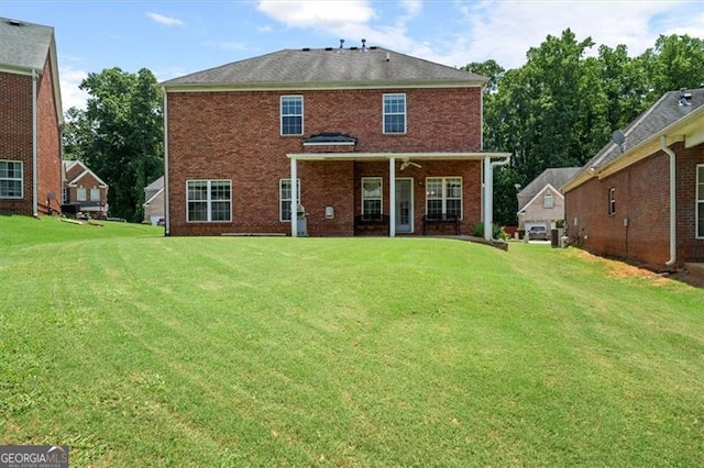 1147 Scenic Park Trl, Lawrenceville, GA 30046 - rear view of house featuring a yard and brick siding
