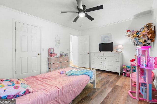 144 Winding Way, Statesboro, GA 30461 - bedroom featuring crown molding, wood finished floors, and a ceiling fan